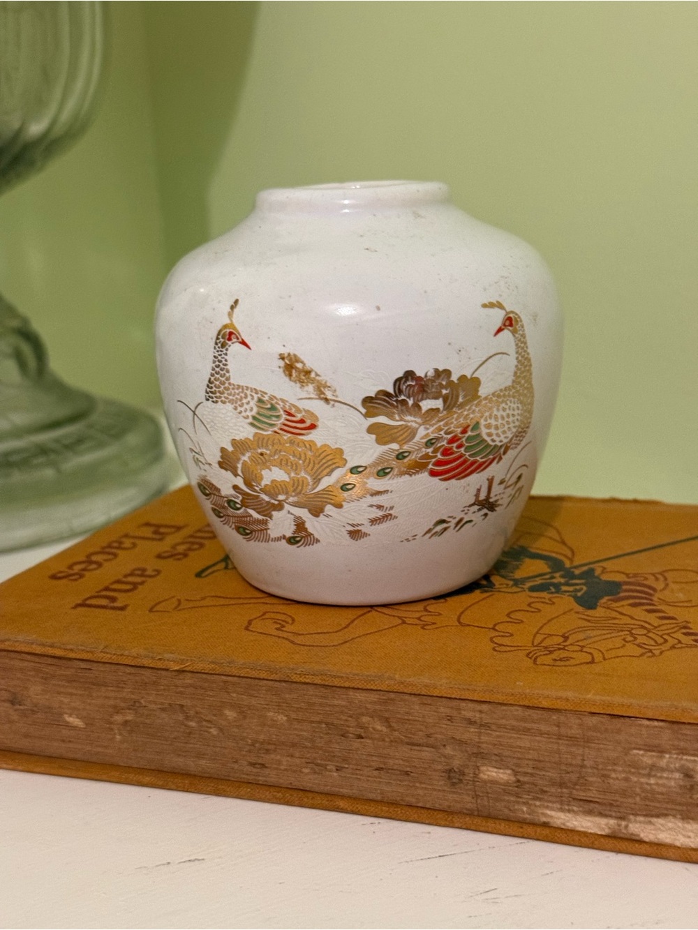 Hand-Painted White Ceramic Vase with Gold and Red Peacock Motif